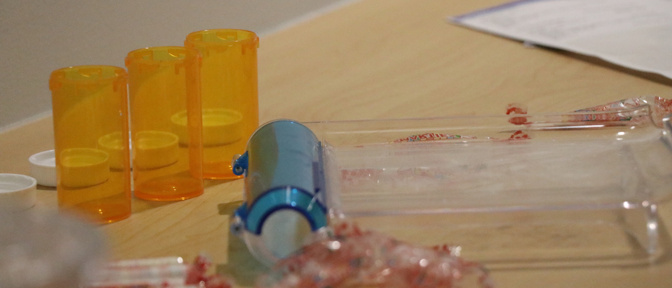Pill bottles on a counter.